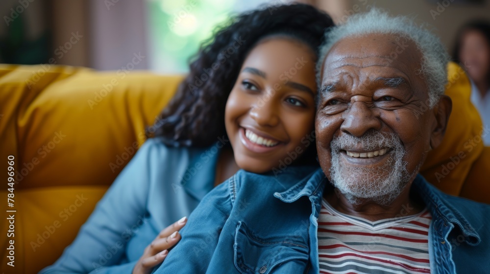 Happy black woman visiting her senior father in nursing home Happy black woman visiting her senior father in nursing home