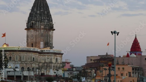 Sacred Hindu temple with its vibrant architecture and dramatic sky at evening from different angle photo