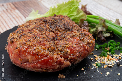 Vegan mock meat, made of wheat gluten, plant based. Steamed, roasted and sliced