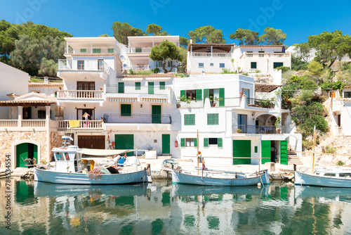 White houses with traditional boats in the port of Cala Figuera - 2534
