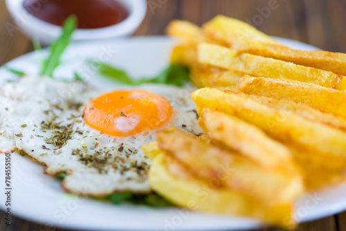 fries with fried eggs