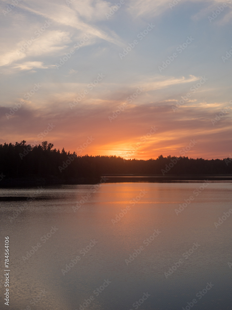 sunset on a forest lake