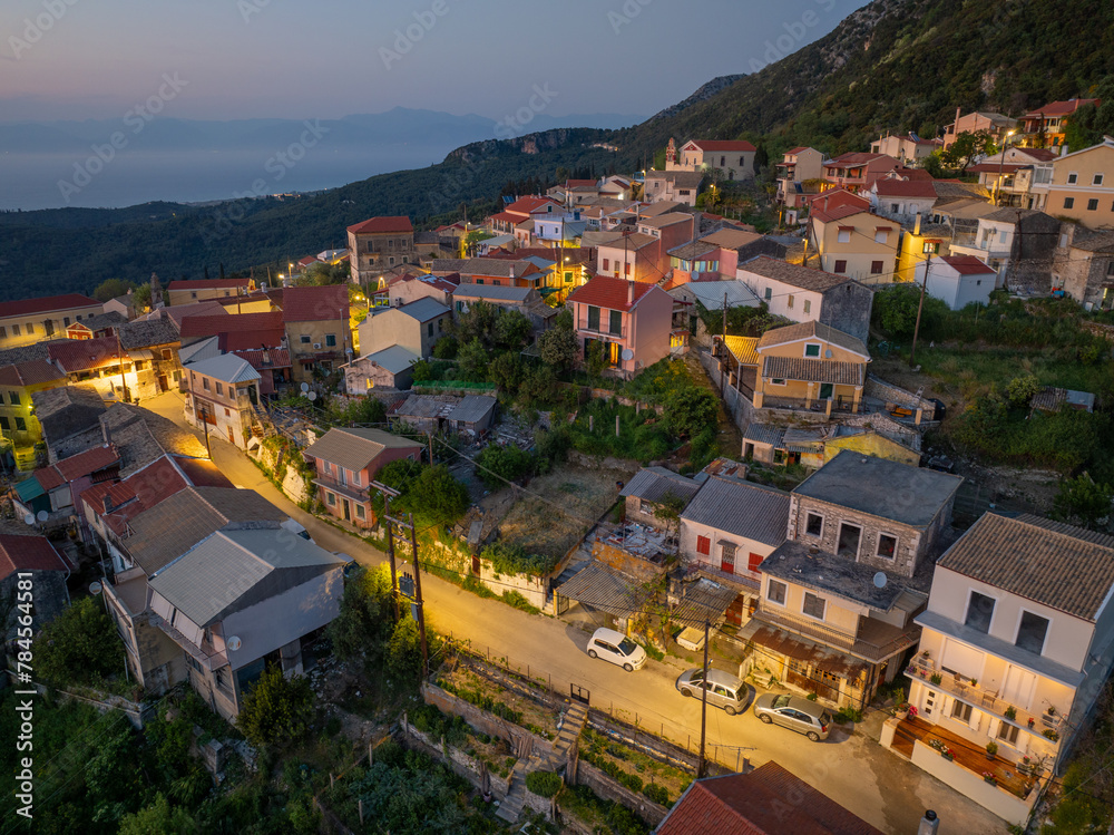 Aerial drone view of traditional Episkepsi village in north corfu,Greece by night, Summer time