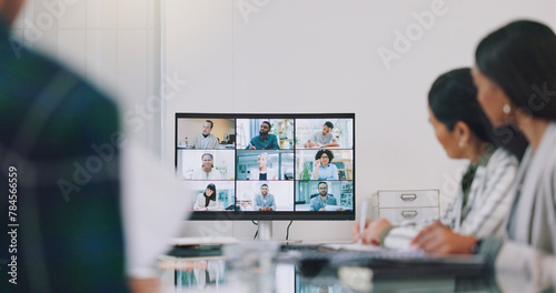 Video conference, business people and meeting of team in boardroom of online presentation, plan discussion or workshop. Group, virtual communication or global webinar call on digital screen in office photo