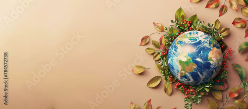 world globe surrounded by leaves