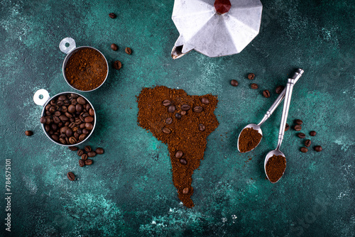 Grounded coffee and beans from South America © Yulia Furman