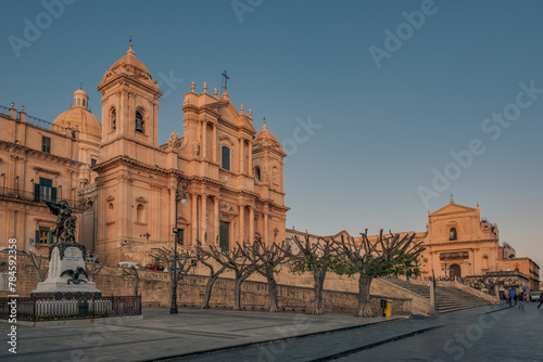The main street and the main square of the baroque city of Noto under sunset light, Syracuse province, Sicily, Italy