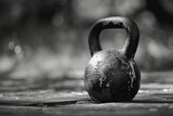 Monochrome Image of Heavy Iron Kettlebell Weight Resting on the Ground