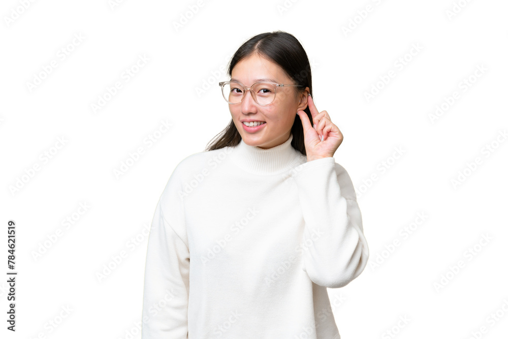 Young Asian woman over isolated background laughing Young Asian woman over isolated background laughing