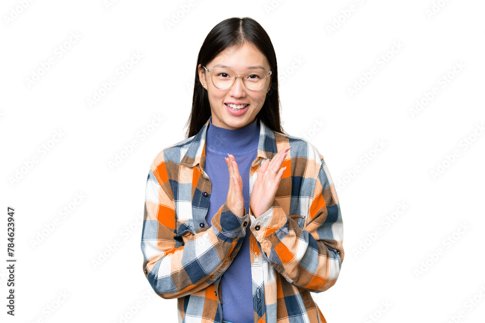 Young Asian woman over isolated chroma key background applauding after presentation in a conference Young Asian woman over isolated chroma key background applauding after presentation in a conference