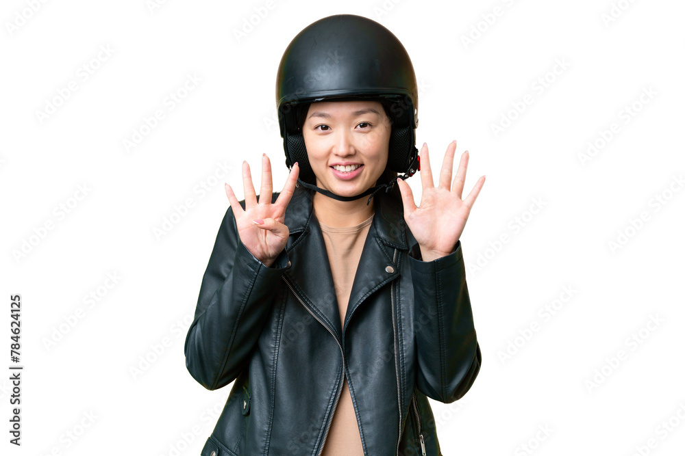 Young Asian woman with a motorcycle helmet over isolated chroma key background counting nine with fingers Young Asian woman with a motorcycle helmet over isolated chroma key background counting nine with fingers