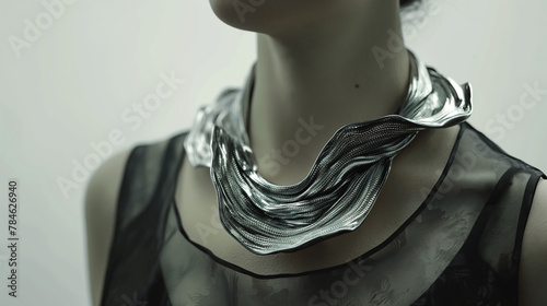 Unique silver ripple necklace on woman perfect for high-end fashion promotion or editorial