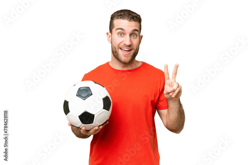 Handsome young football player man over isolated chroma key background smiling and showing victory sign