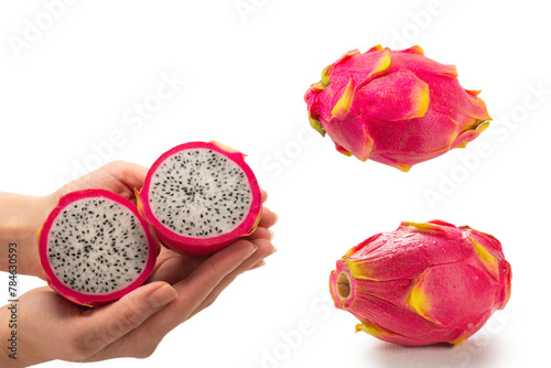 Sweet tasty dragon fruit or pitaya in woman hand isolated.