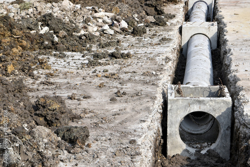 pipeline installation, dug concrete road to laying underground drain system
