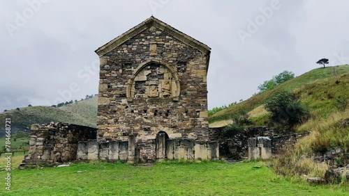 Thaba-Yerdy in Ingushetia. ZEISS, RUSSIA - MAY 19, 2023: Video of the Thaba-Yerdy Temple, the oldest temple in Ingushetia. The Caucasus Mountains. 4K	 photo