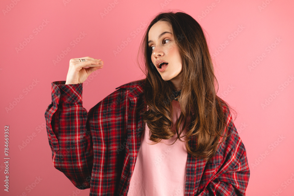 Brunette indignant woman showing blah blah blah gesture with hands isolated on studio pink background. Empty promises, blah concept. Lier, not interested. Annoyed girl making bla bla bla hand gesture Brunette indignant woman showing blah blah blah gesture with hands isolated on studio pink background. Empty promises, blah concept. Lier, not interested. Annoyed girl making bla bla bla hand gesture