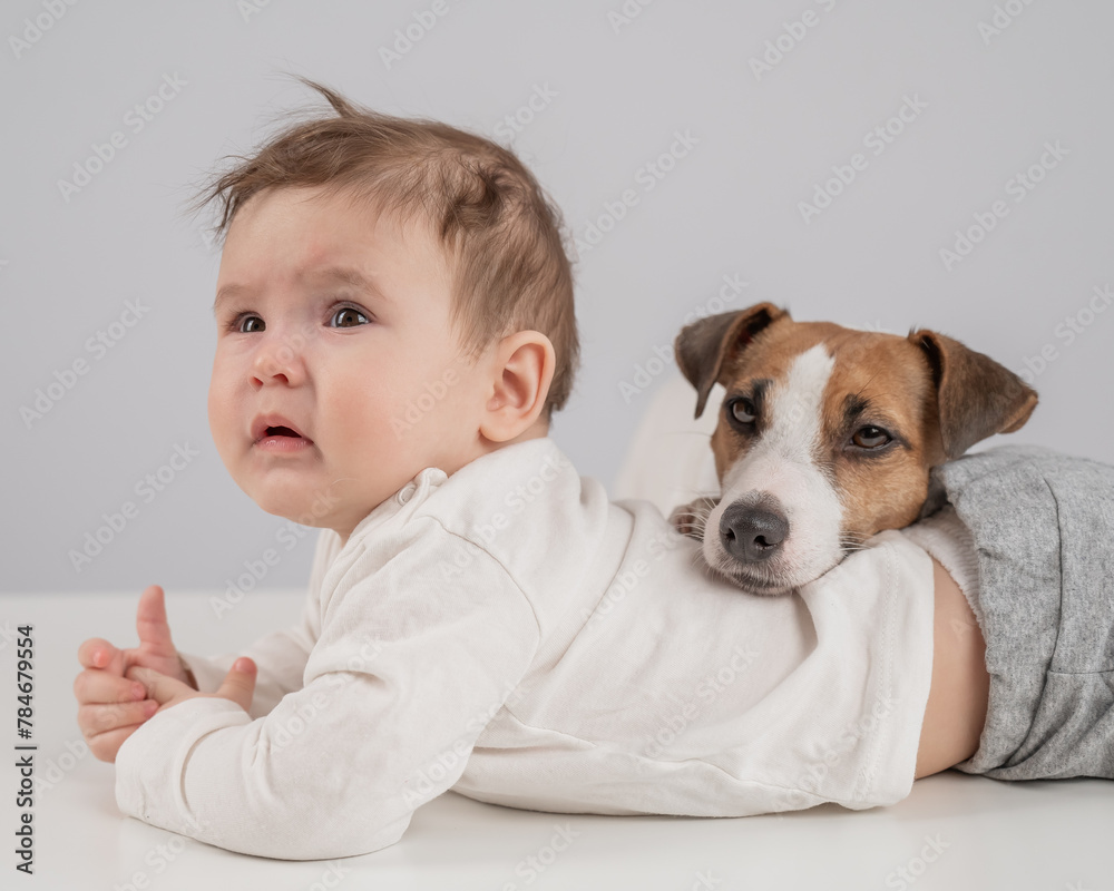 Cute baby in glasses and suit working on laptop. Cute baby in glasses and suit working on laptop.