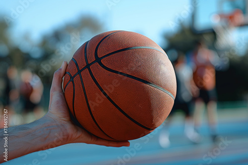 Holding Basketball Ready for Game on Outdoor Court