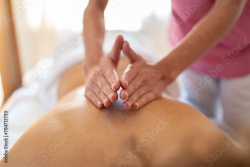 Wallpaper Mural Masseuse doing massage with hands in recovery center Torontodigital.ca