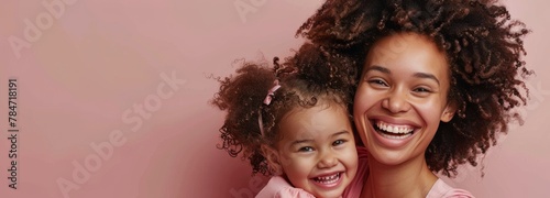 Woman Holding Little Girl in Her Arms