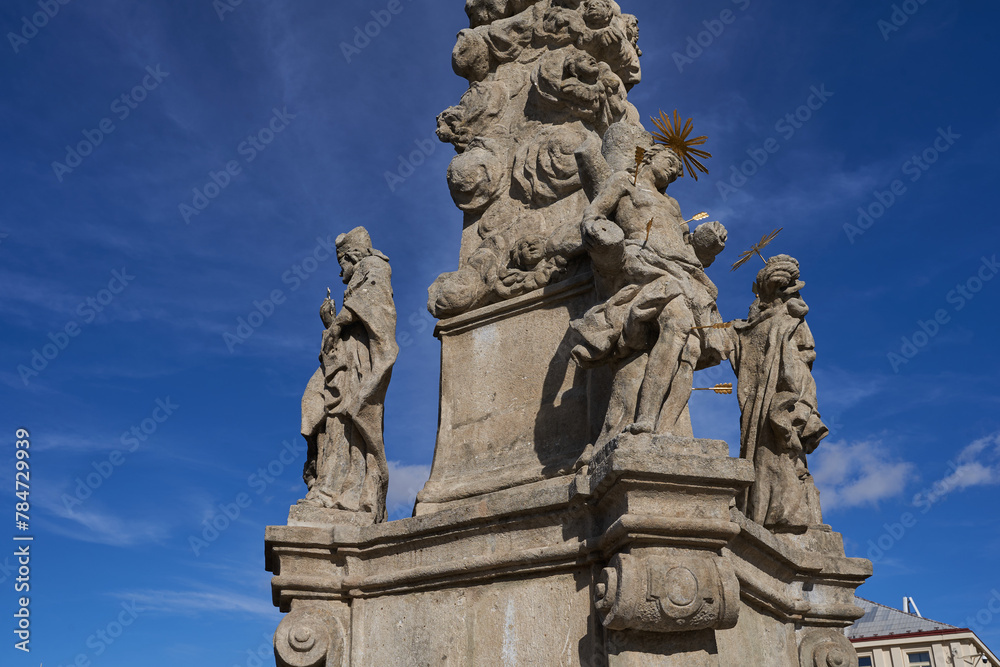Caslav, Czech Republic - February 24, 2024 - the Marian Plague Column on the Zizka Square on a sunny winter day