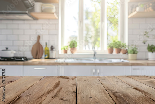 Empty Beautiful wood table top and blur bokeh modern kitchen interior background in clean and bright