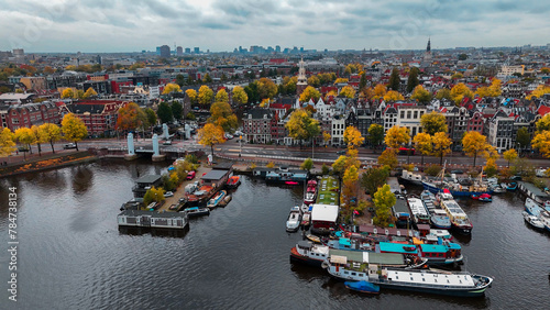 Photography Aerial drone view Amsterdam autumn cityscape narrow old houses, canals, boats bi