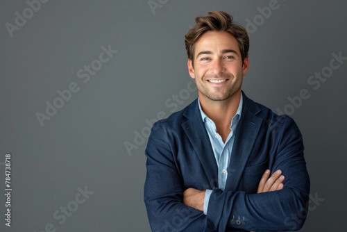 Smiling man with arms crossed