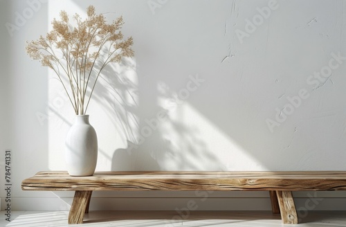 White Vase With Dried Plants on Table