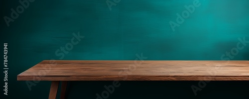 Abstract background with a dark turquoise wall and wooden table top for product presentation, wood floor, minimal concept, low key studio shot, high resolution photography 