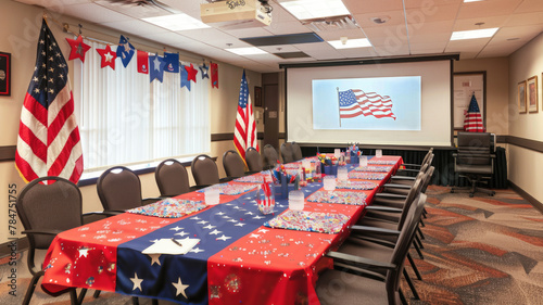 meeting room festively decorated with patriotic decor, including American flags, a stars-and-stripes tablecloth, and matching balloons, set for a Labor Day celebration