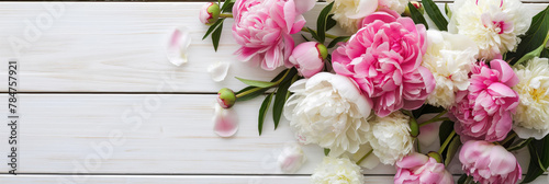 Peonies bouquet with pink and white blooms on white table. Copy space. Generative AI