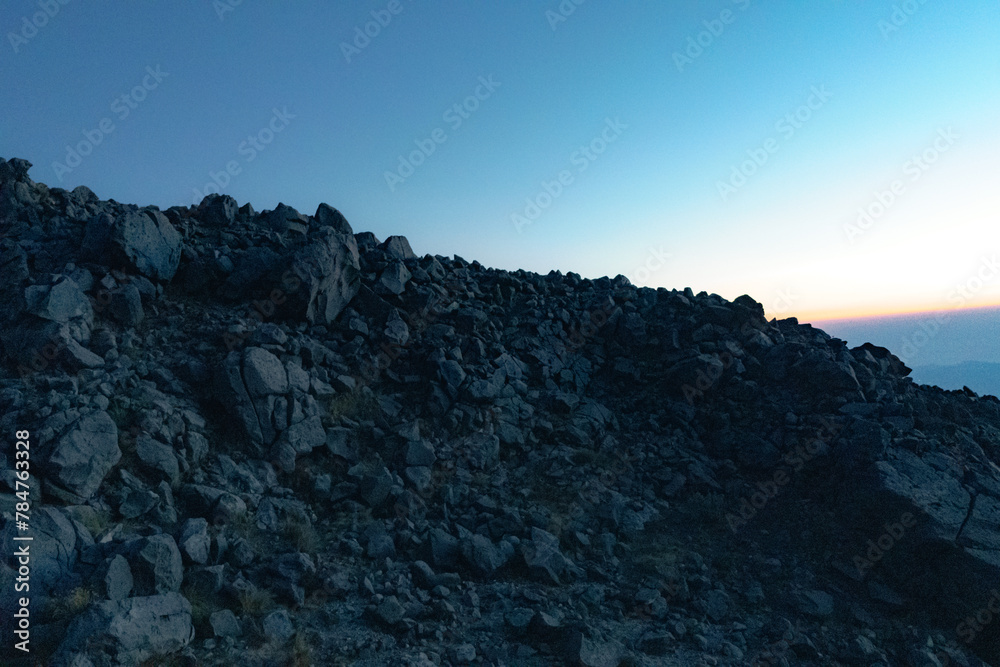 Naklejka premium Photographic series documenting the adventure of climbing Tajumulco Volcano, San Marcos, Guatemala. Showcasing diverse landscapes, sunsets, mountain terrains, plants, and fellow adventurers. Focusing 