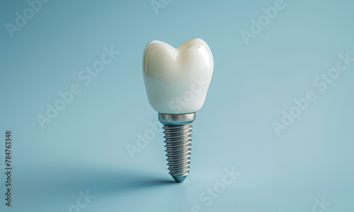 Model of Dental implants with a pin on a blue background. Medicine concept, World Oral Health Day