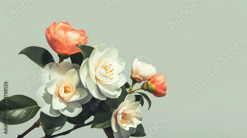 A bouquet of camellia blossoms with lifelike colour