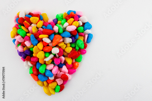 Heart formed with decorative stones of many colors