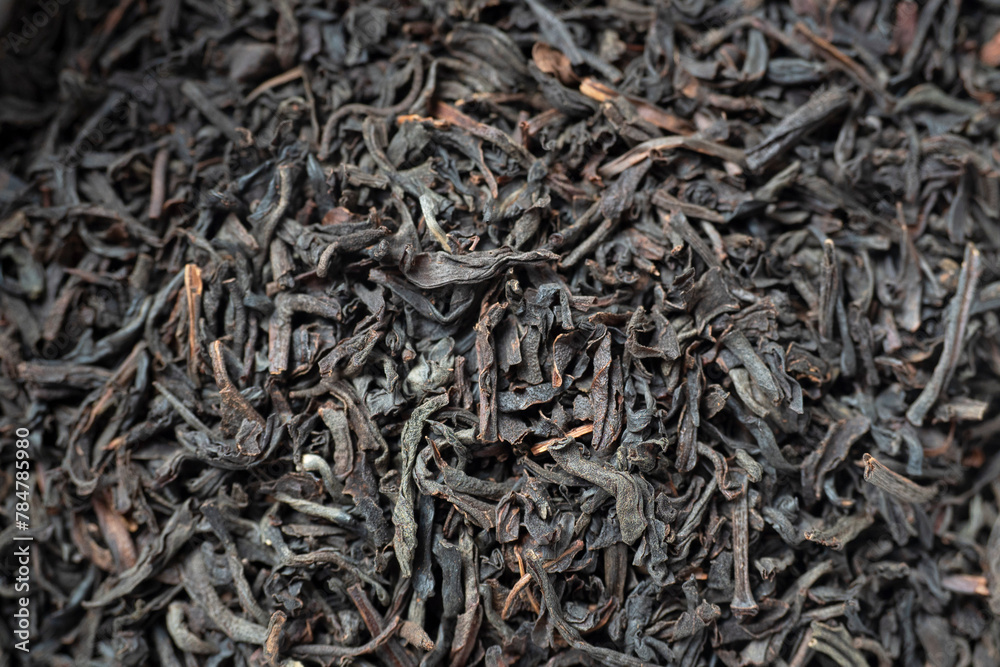 Close-up texture of dry black tea. Traditional tea from India, China Close-up texture of dry black tea. Traditional tea from India, China