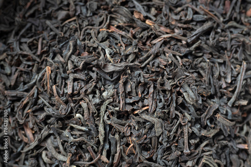 Close-up texture of dry black tea. Traditional tea from India, China