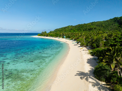 Beautiful white sand beach and crystal clear water. Cobrador Island. Romblon, Philippines. © MARYGRACE