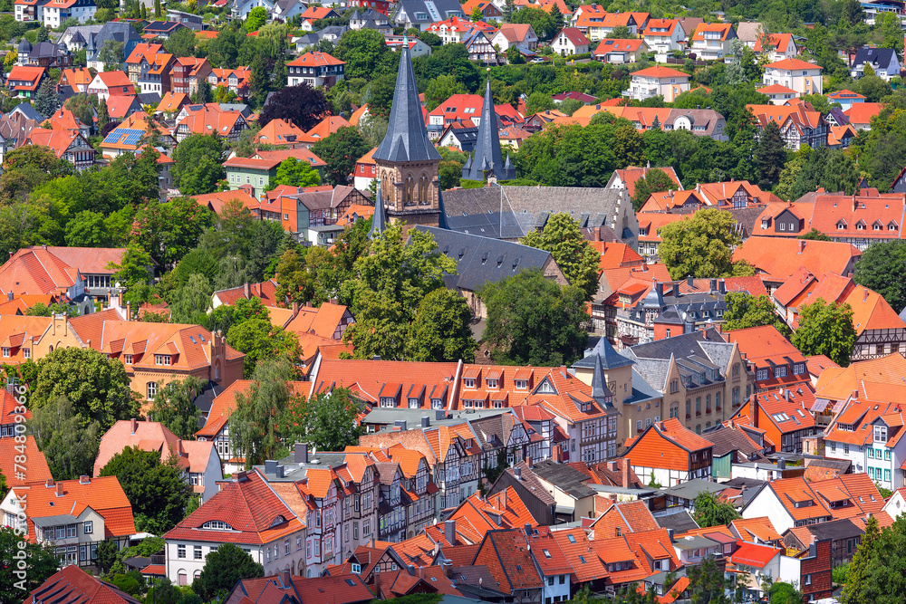 Obraz premium Aerial view of Wernigerode with distinctive red roofs and lush Harz foothills, Germany