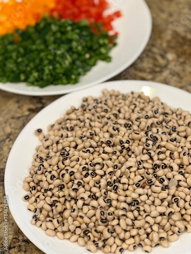 black eye peas and blur cut vegetables background 