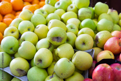 Image of fresh apples on the counter in supermarket