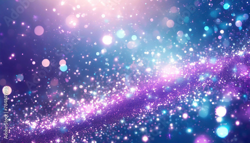 Magical glittering particles in blue and purple  abstract background.