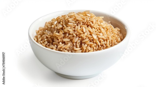 Brown rice in white bowl isolated on white background.