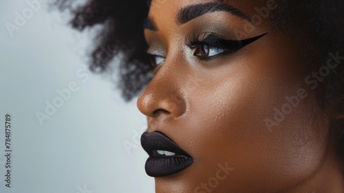 A bold and edgy black lipstick making a statement and challenging societal beauty standards. .