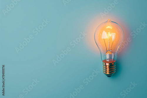 A glowing glass light bulb symbolizing bright ideas and innovation