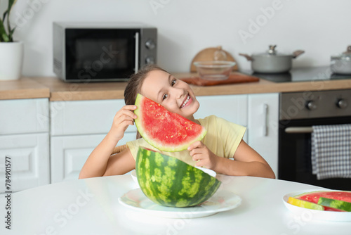 Happy little girl with slic...
