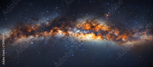 Vibrant and colorful, a galaxy with a luminous mix of orange and blue hues, scattered with numerous shining stars