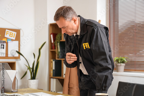 Mature FBI agent working at...